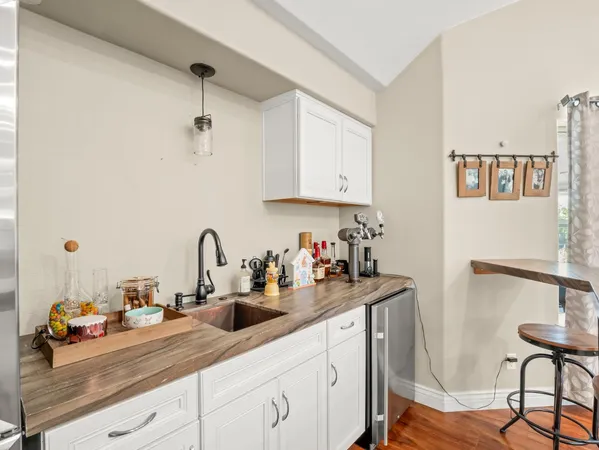 a kitchen with a sink and cabinets