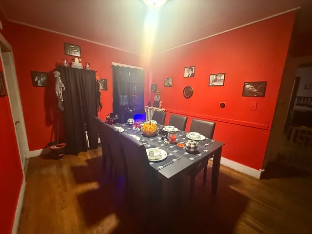 a dining table with chairs and a table