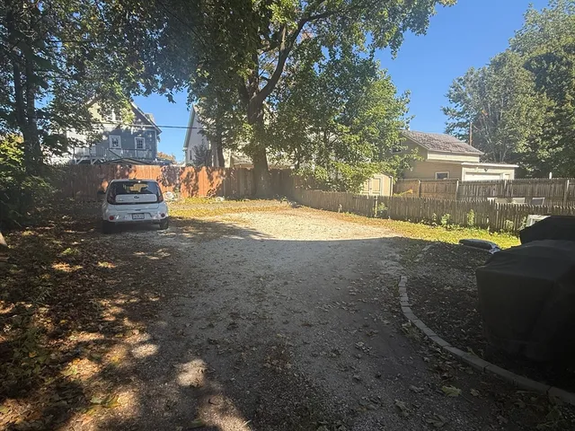 a view of a backyard with plants
