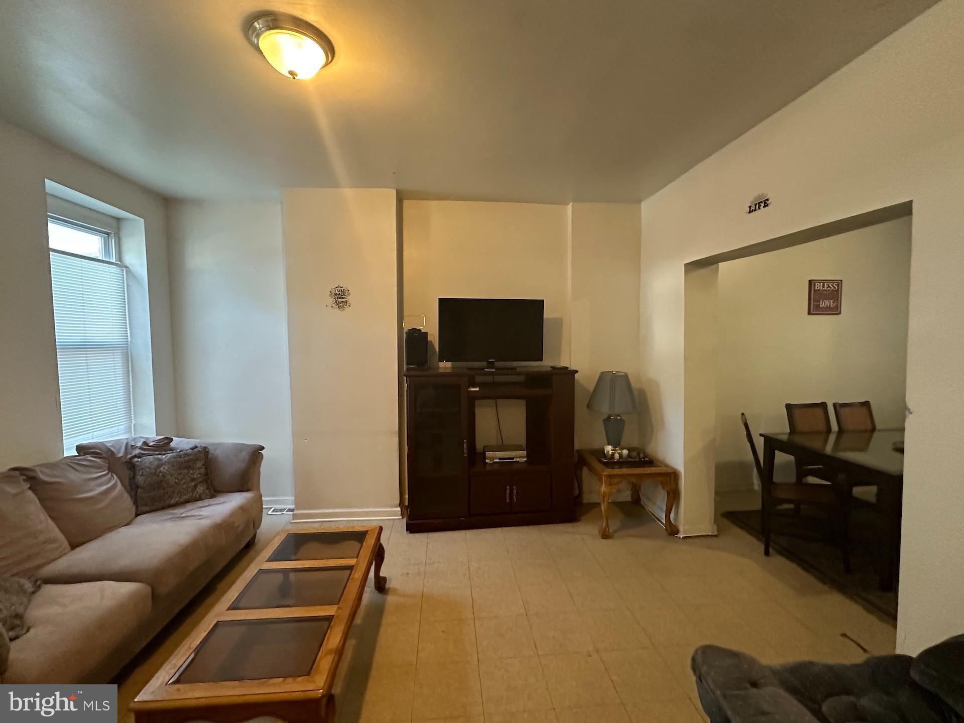 3926 Ridgewood Avenue Baltimore, MD 21215 - Photo 3 of 21 Cozy living space with natural light.