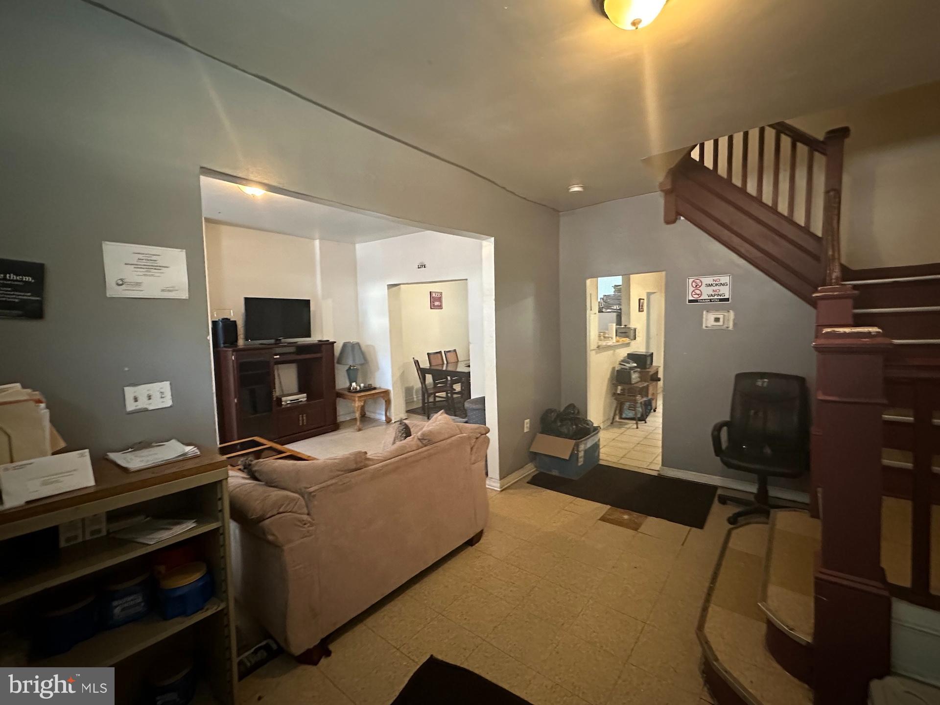 3926 Ridgewood Avenue Baltimore, MD 21215 - Photo 4 of 21 Inviting entryway with charming staircase.