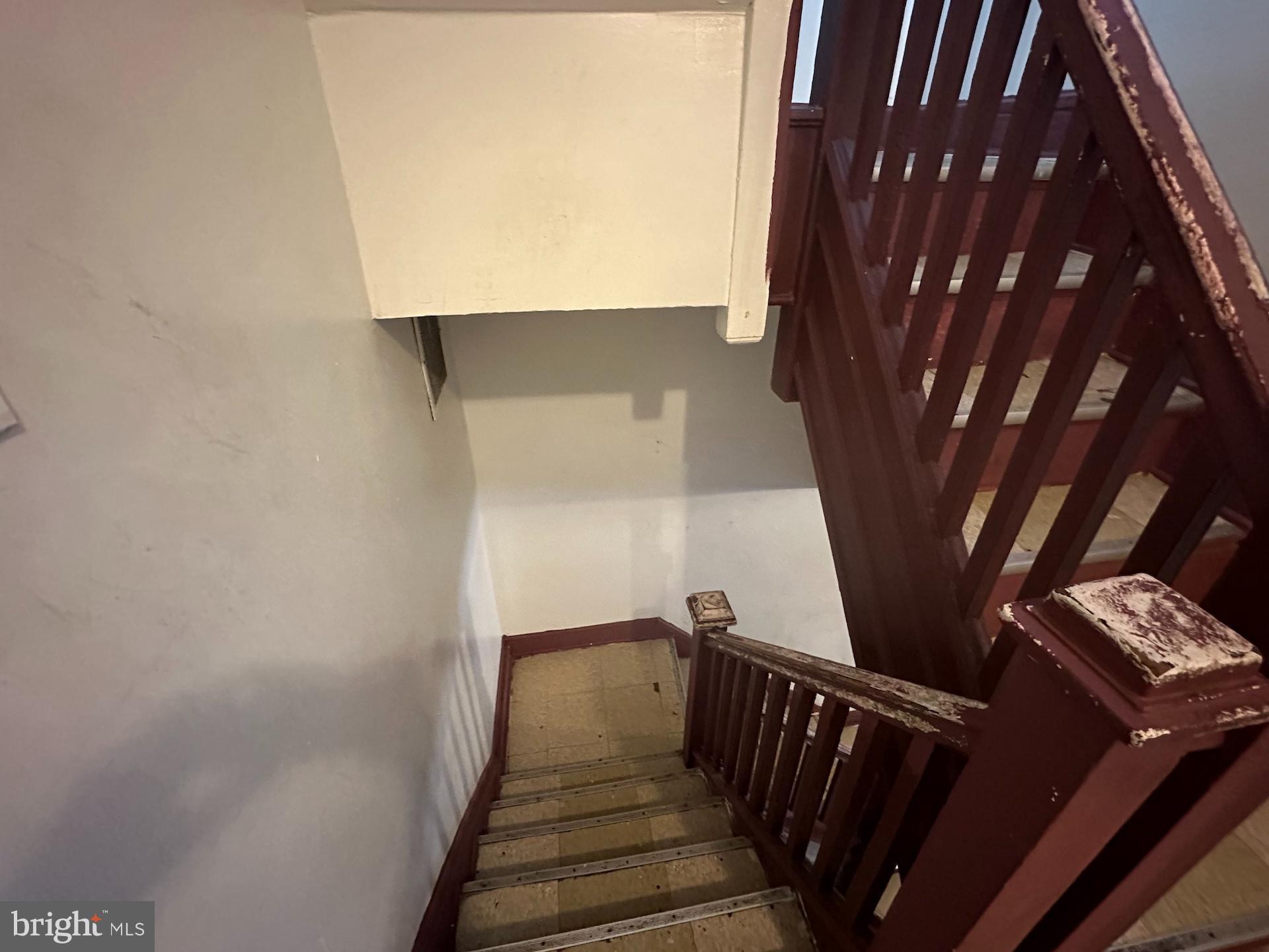 3926 Ridgewood Avenue Baltimore, MD 21215 - Photo 8 of 21 Charming staircase with vintage appeal.