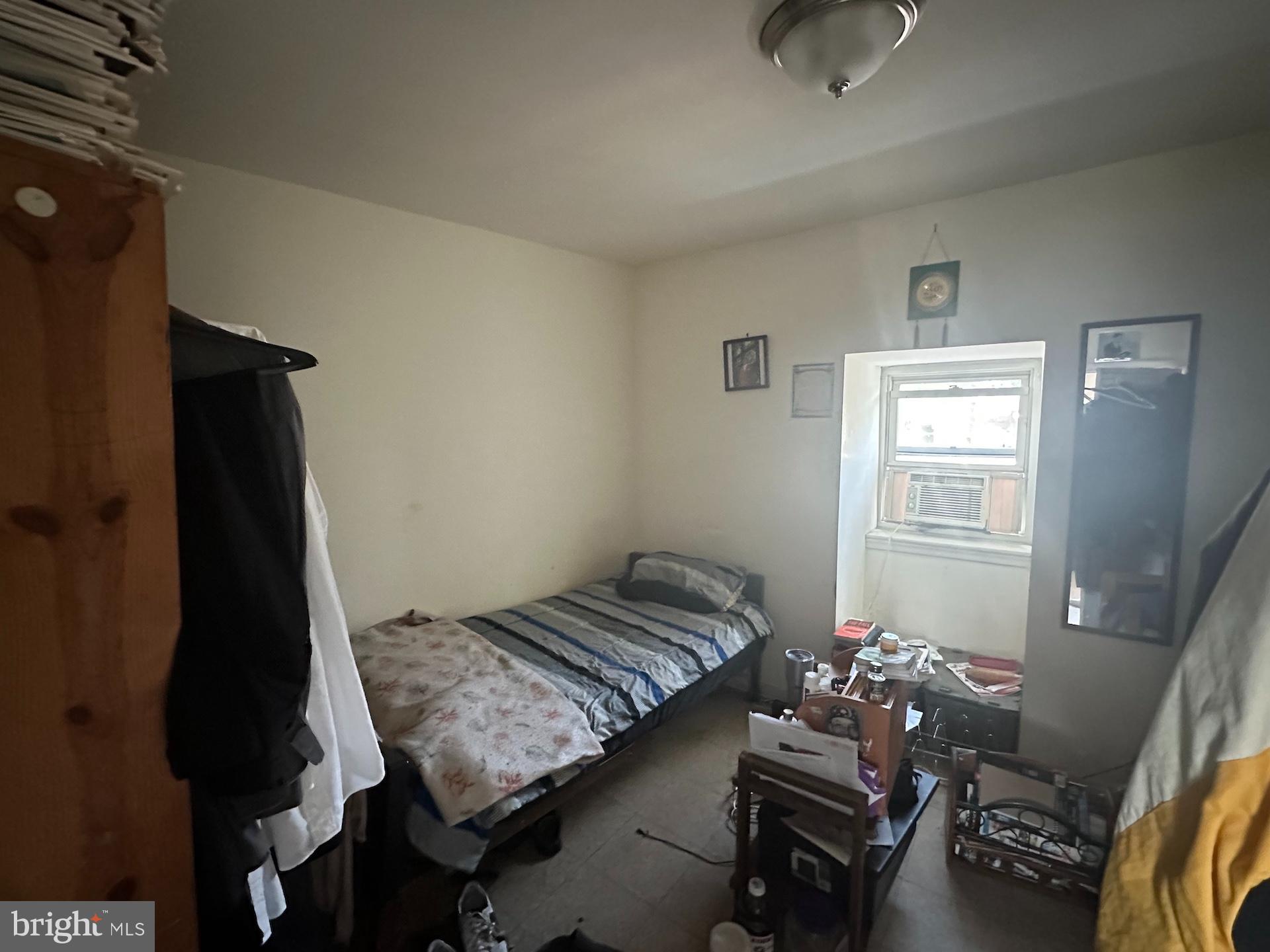 3926 Ridgewood Avenue Baltimore, MD 21215 - Photo 10 of 21 Cozy bedroom #2 with natural light and character.