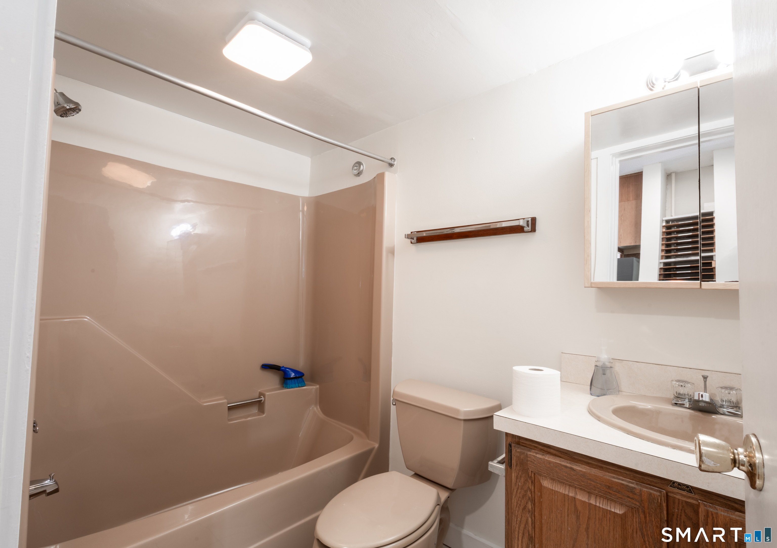 89 Hempstead Street New London, CT 06320 - Photo 9 of 14 a bathroom with a sink a toilet and shower