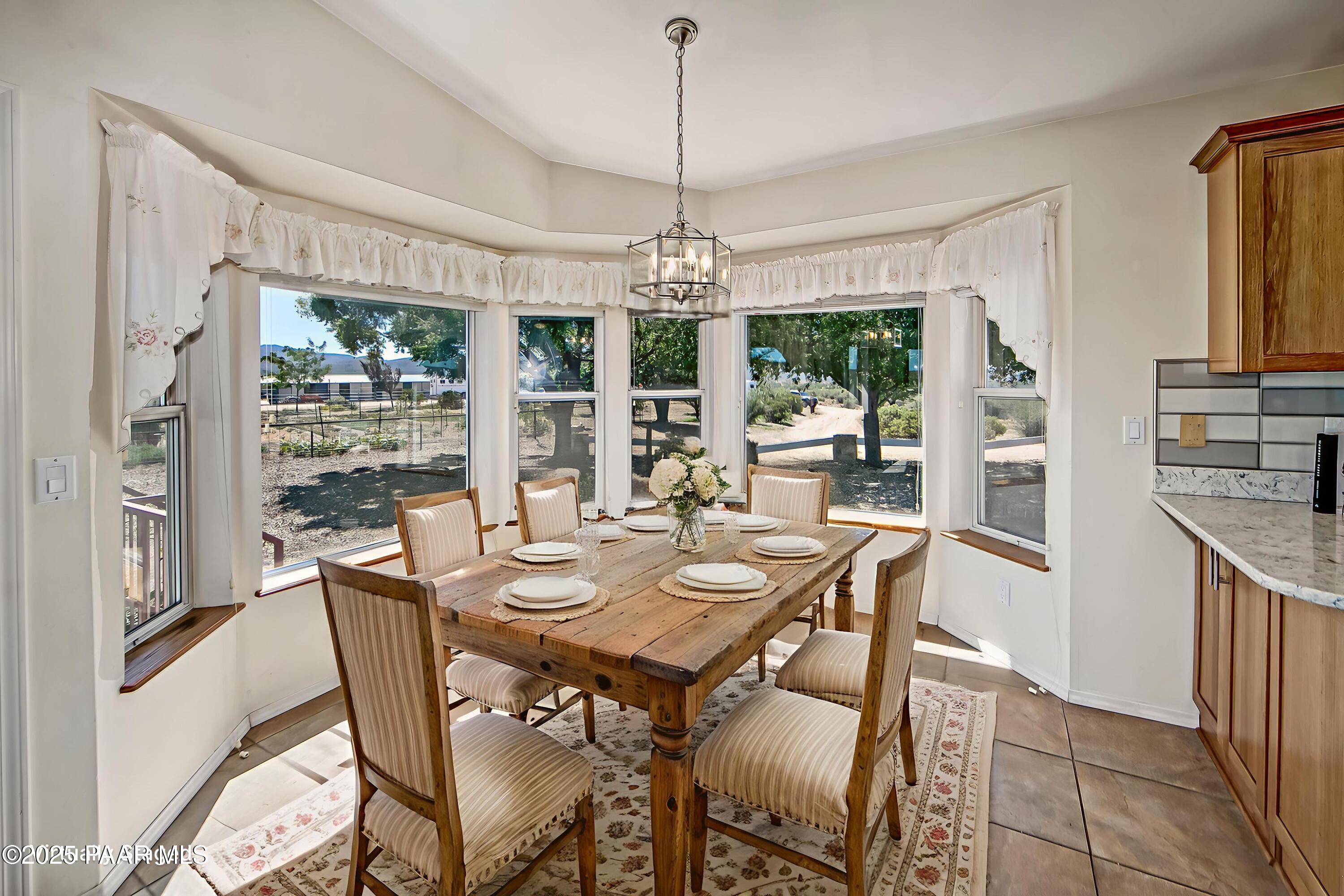 11800 West Faded Whistle Road Prescott, AZ 86305 - Photo 14 of 65 Dining Room Virtually Staged