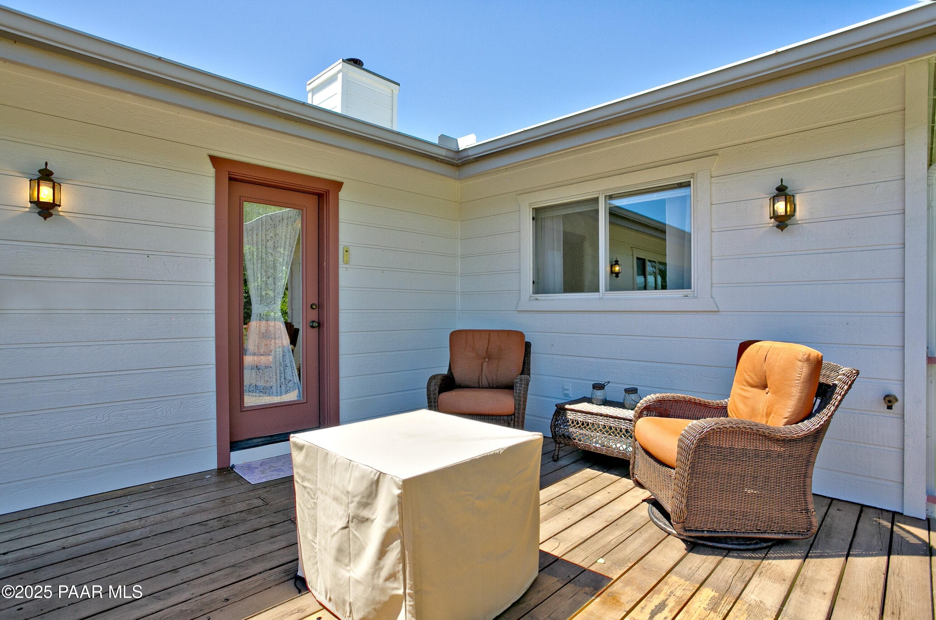 11800 West Faded Whistle Road Prescott, AZ 86305 - Photo 22 of 65 a outdoor space with a couch