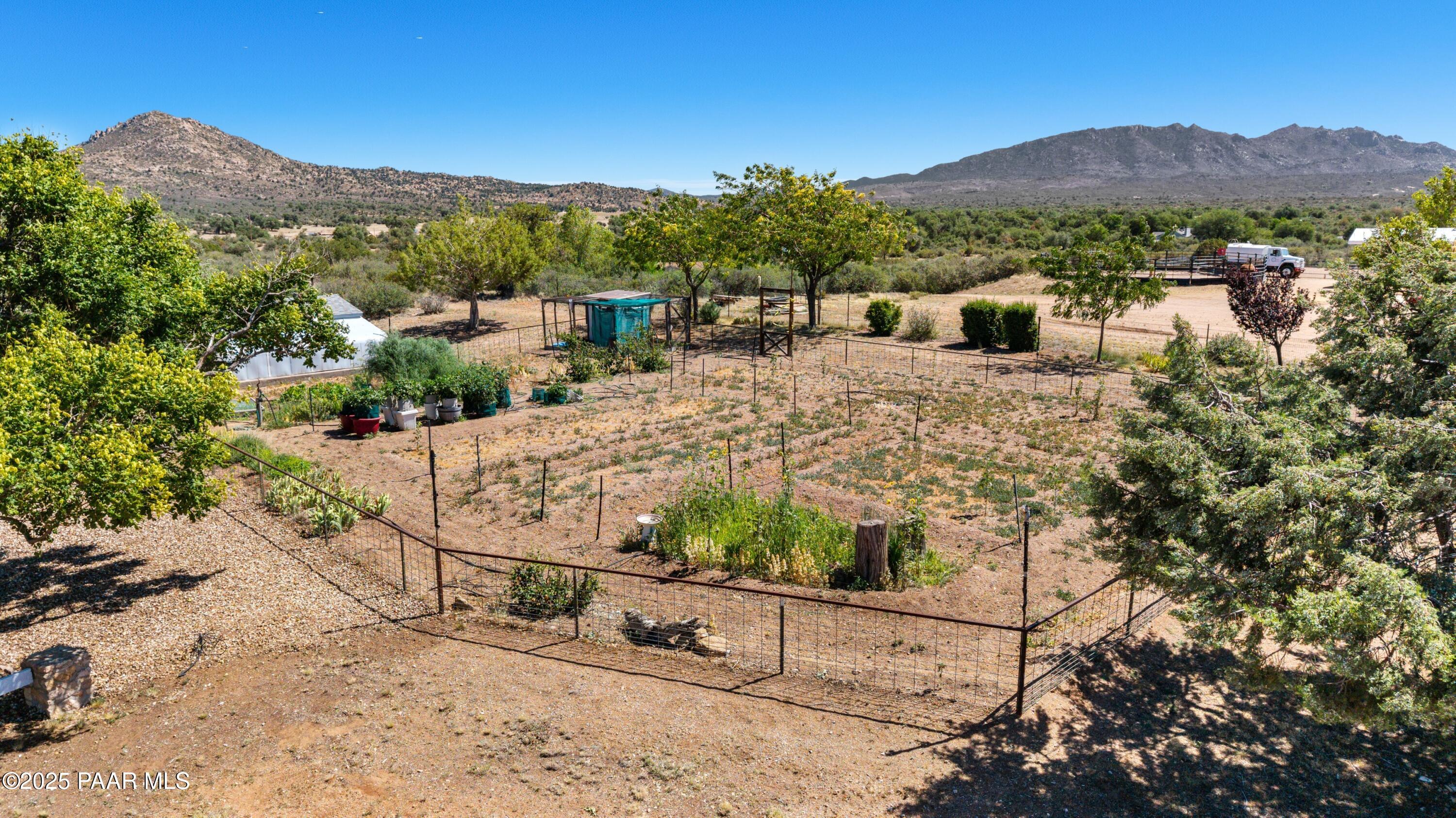 11800 West Faded Whistle Road Prescott, AZ 86305 - Photo 3 of 65 a view of a house with a yard