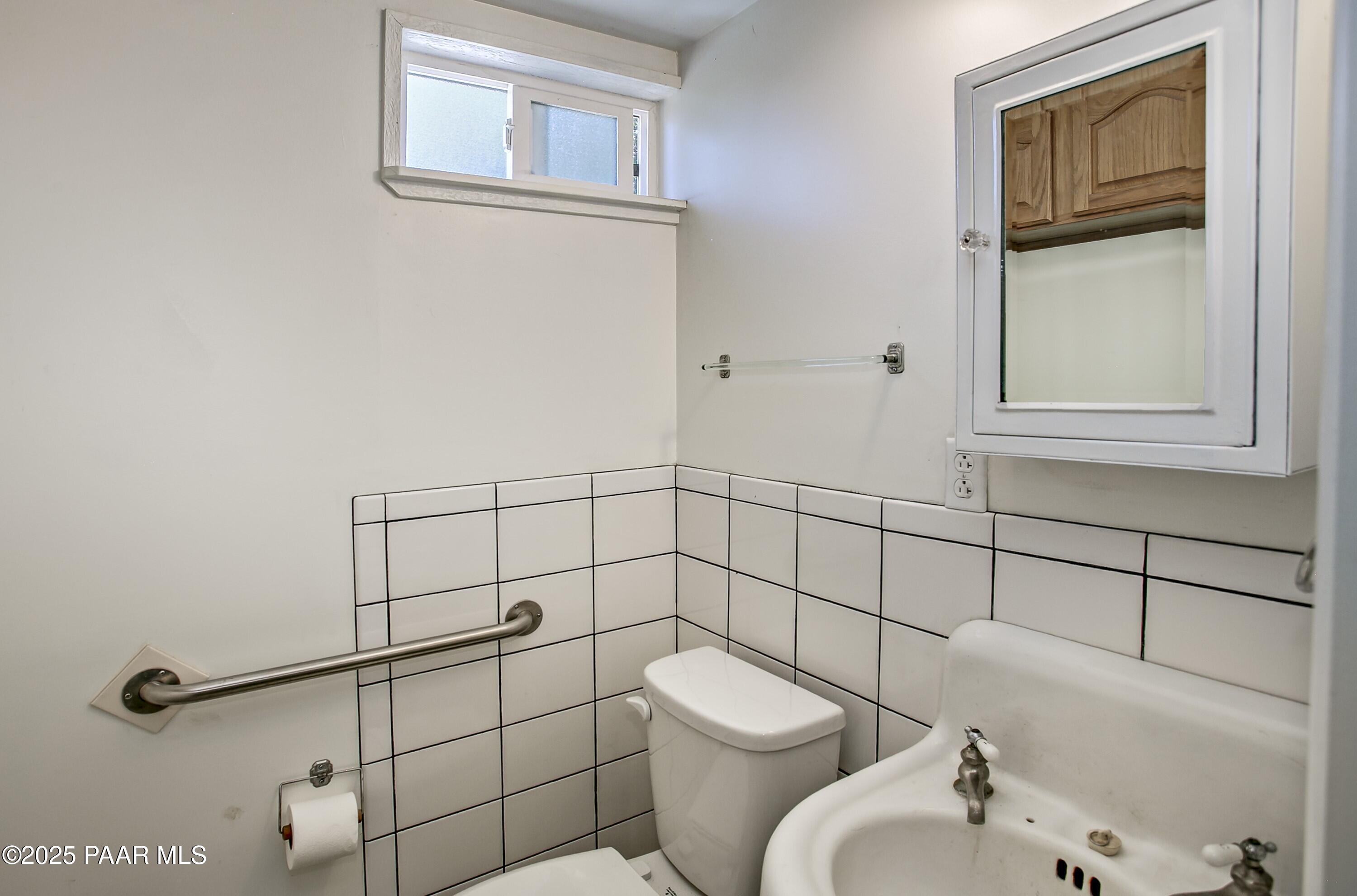 11800 West Faded Whistle Road Prescott, AZ 86305 - Photo 54 of 65 Workshop 1/2 Bathroom