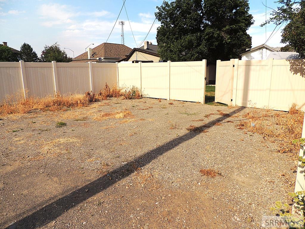329 North Bridge Street St. Anthony, ID 83445 - Photo 14 of 16 Fenced in back parking area, Plenty of room here for boats, snowmachines, and RV's in addition to large personal vehicles