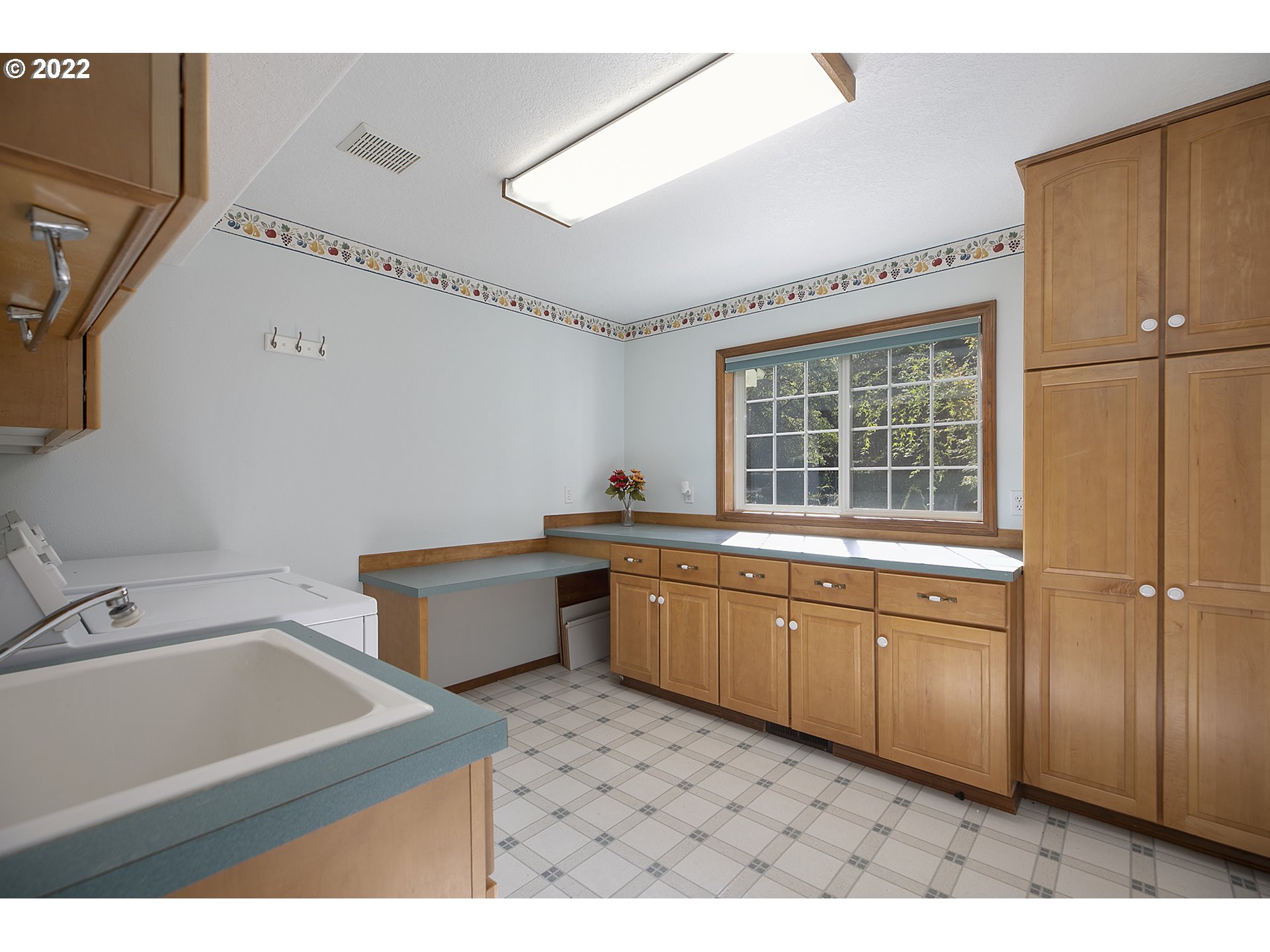 43221 Southeast Coalman Road Sandy, OR 97055 - Photo 15 of 32 a kitchen with a sink cabinets and window