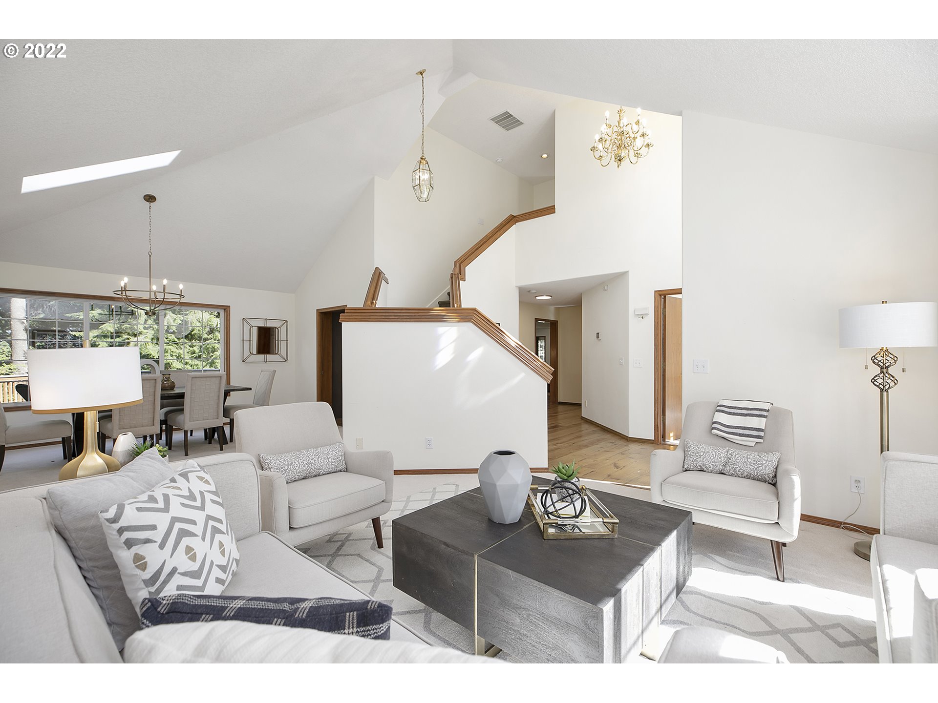 43221 Southeast Coalman Road Sandy, OR 97055 - Photo 5 of 32 a living room with furniture and a chandelier