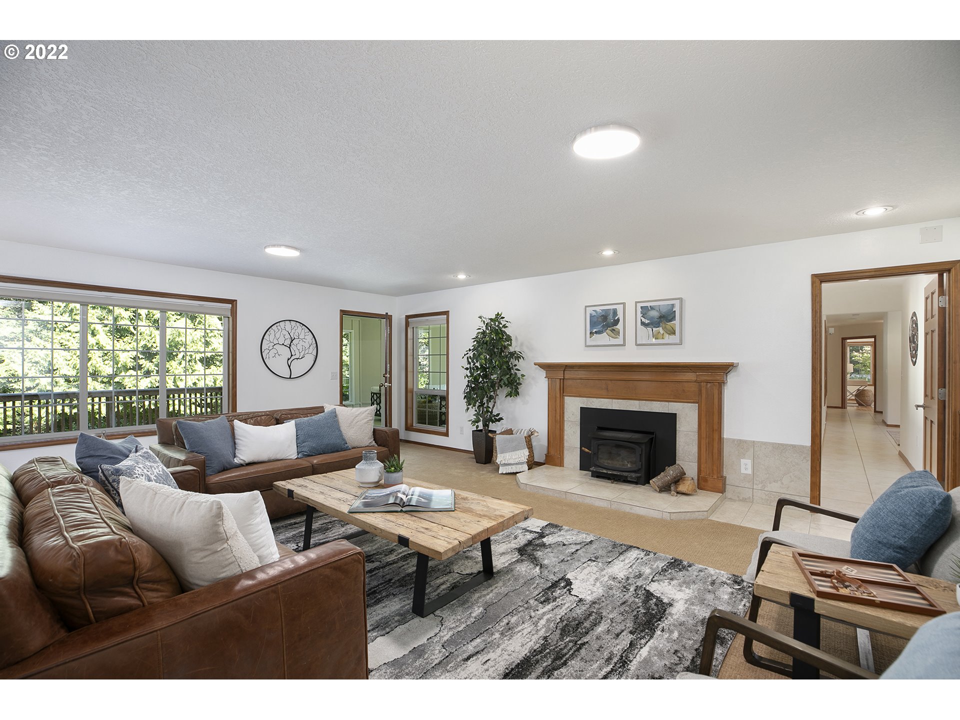 43221 Southeast Coalman Road Sandy, OR 97055 - Photo 10 of 32 a living room with furniture and a fireplace