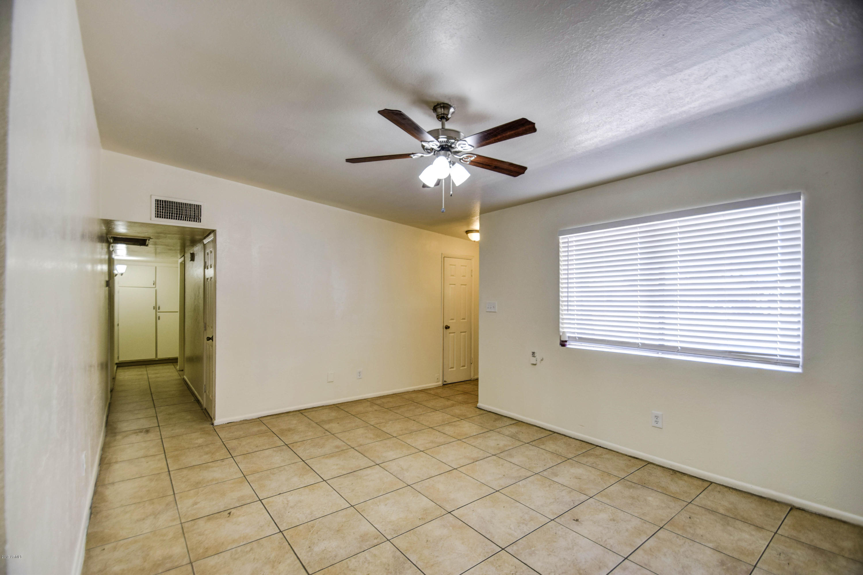 4215 West Cheery Lynn Road Phoenix, AZ 85019 - Photo 6 of 35 Living Room 3
