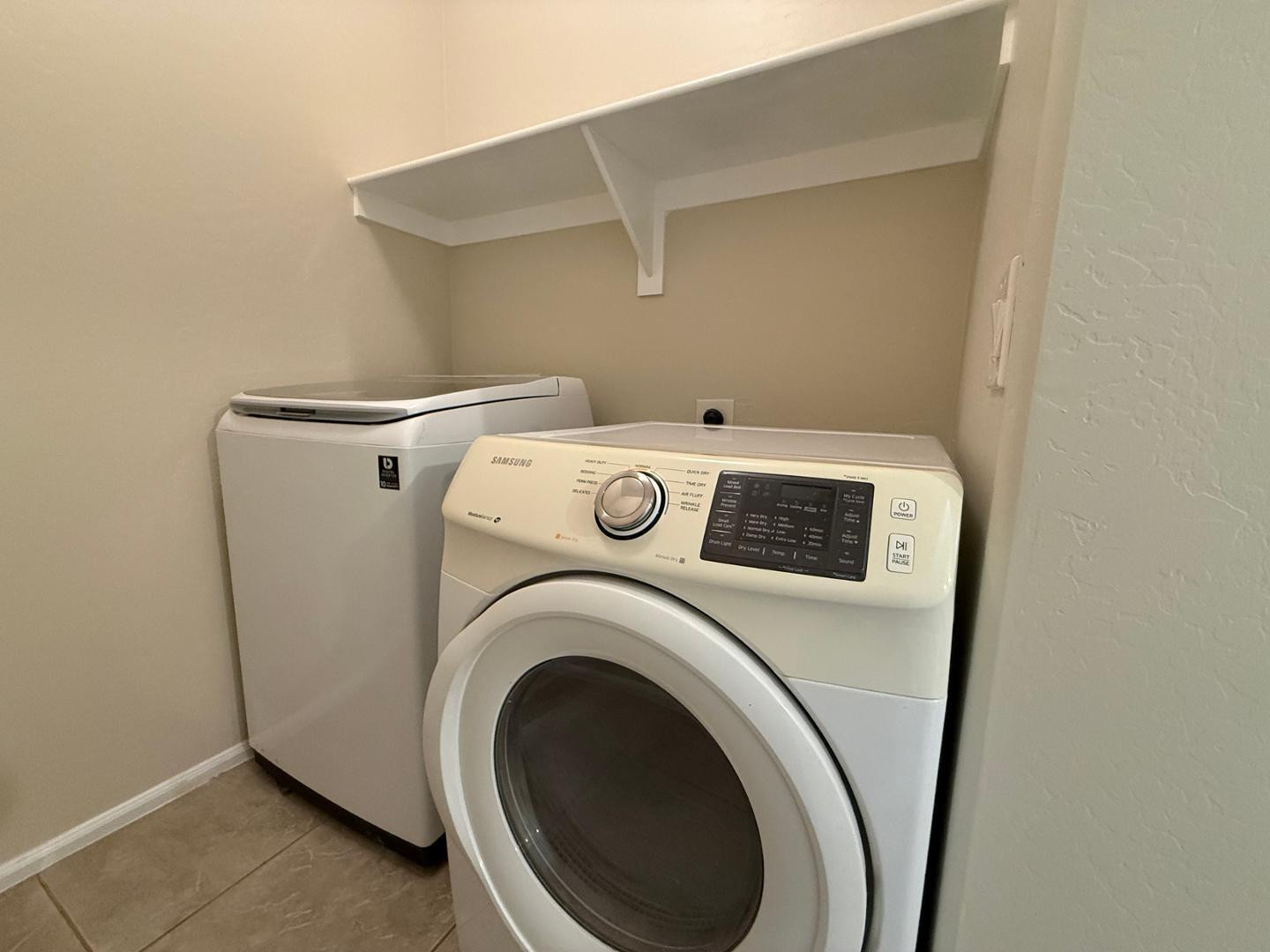 2725 East Mine Creek Road, Unit 1151 Phoenix, AZ 85024 - Photo 11 of 31 a utility room with dryer and washer