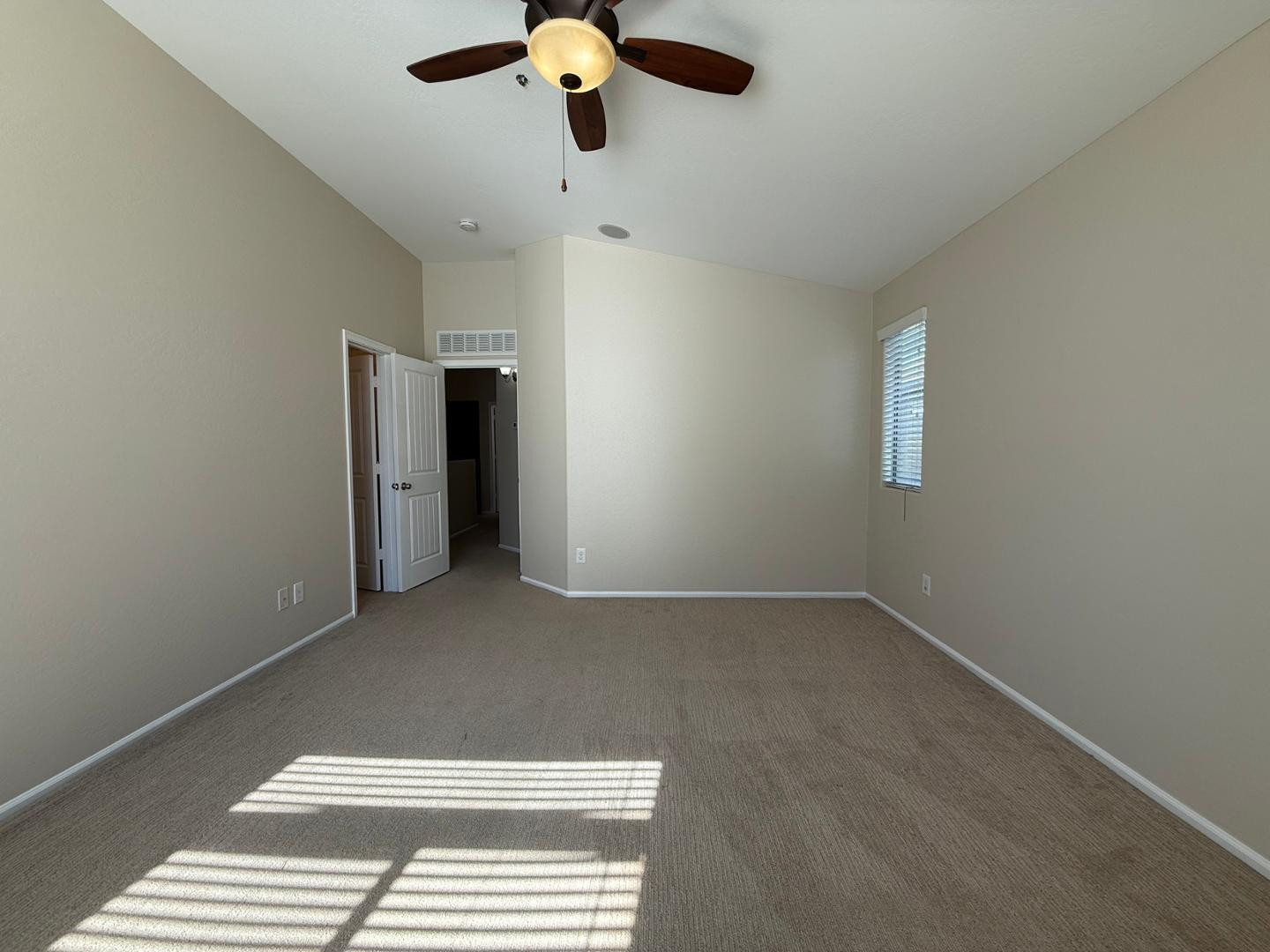 2725 East Mine Creek Road, Unit 1151 Phoenix, AZ 85024 - Photo 16 of 31 a view of a livingroom with a ceiling fan and window