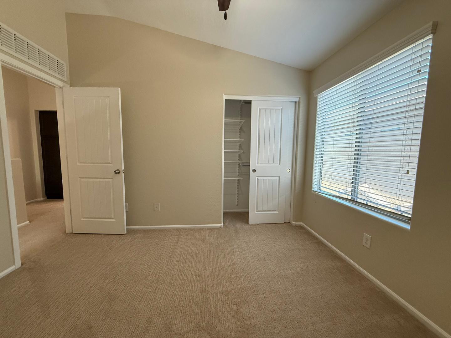 2725 East Mine Creek Road, Unit 1151 Phoenix, AZ 85024 - Photo 20 of 31 an empty room with windows