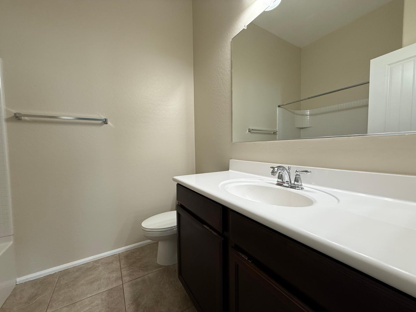 2725 East Mine Creek Road, Unit 1151 Phoenix, AZ 85024 - Photo 27 of 31 a bathroom with a sink and a toilet