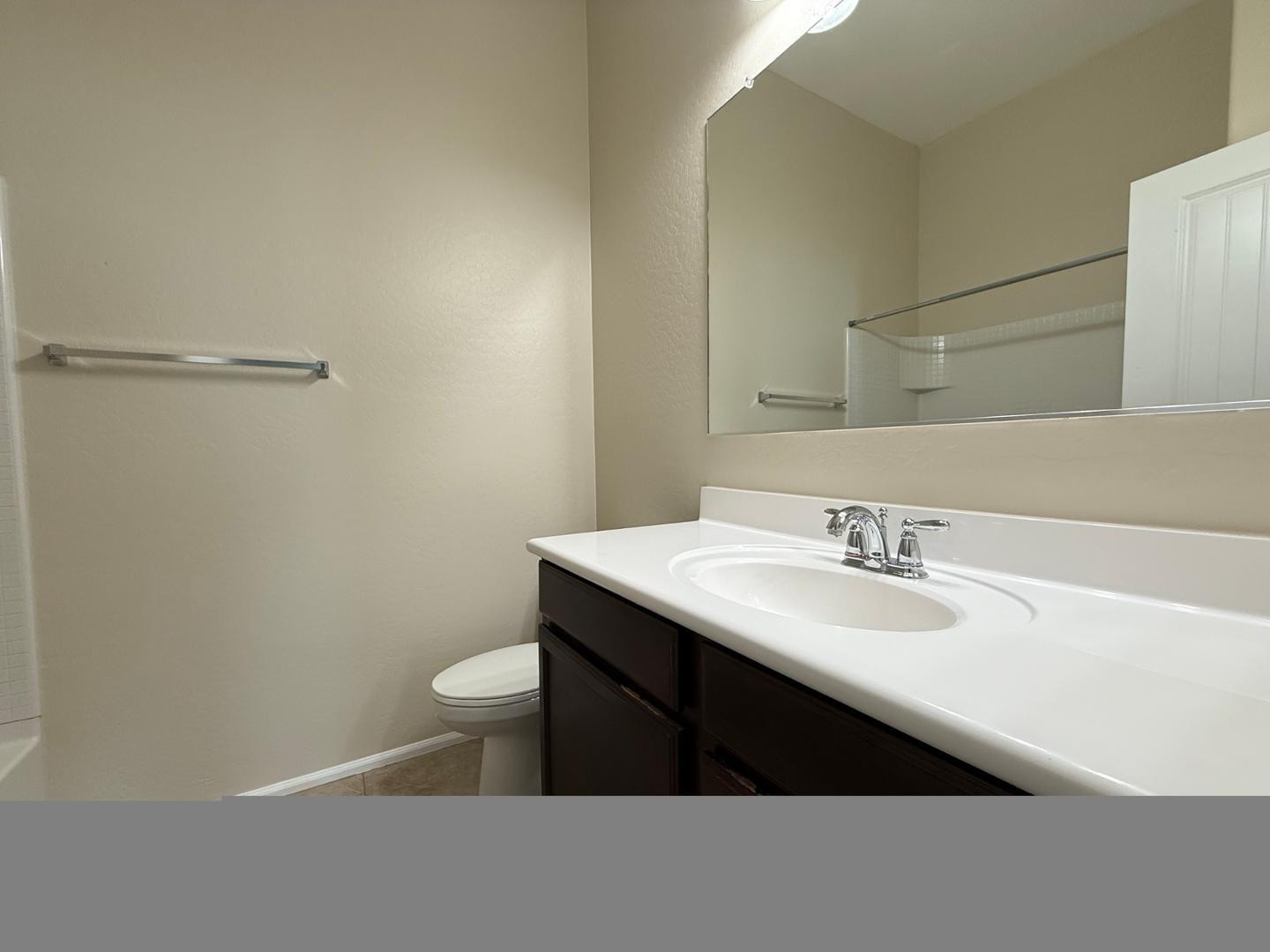 2725 East Mine Creek Road, Unit 1151 Phoenix, AZ 85024 - Photo 29 of 31 a bathroom with a sink and a toilet
