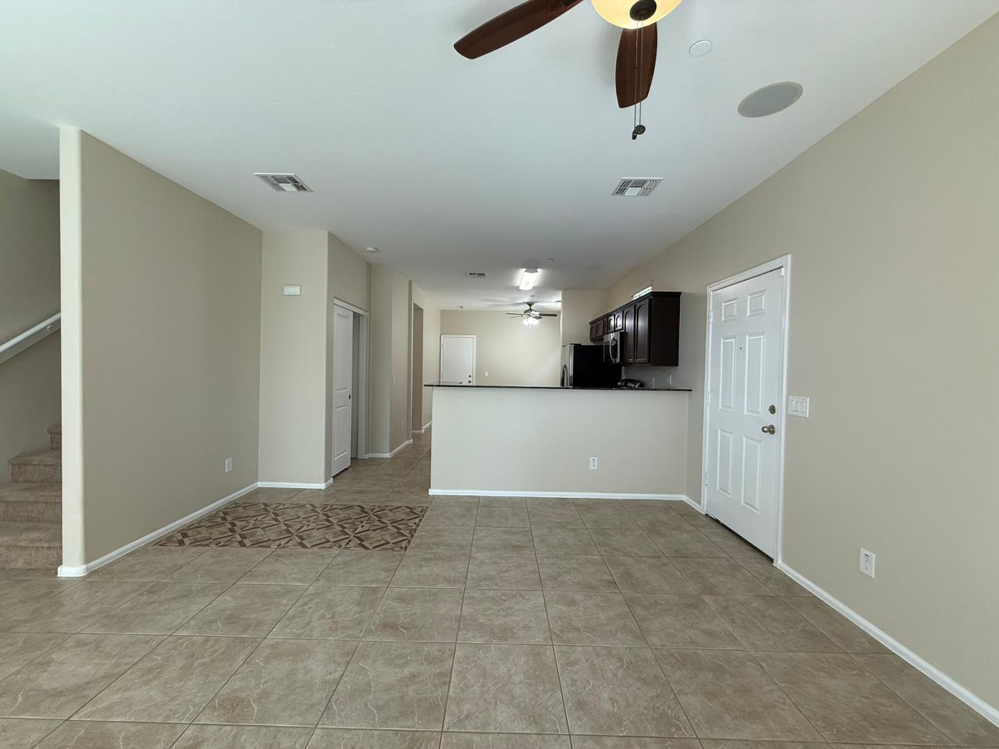 2725 East Mine Creek Road, Unit 1151 Phoenix, AZ 85024 - Photo 4 of 31 a view of a livingroom with a kitchen and a window