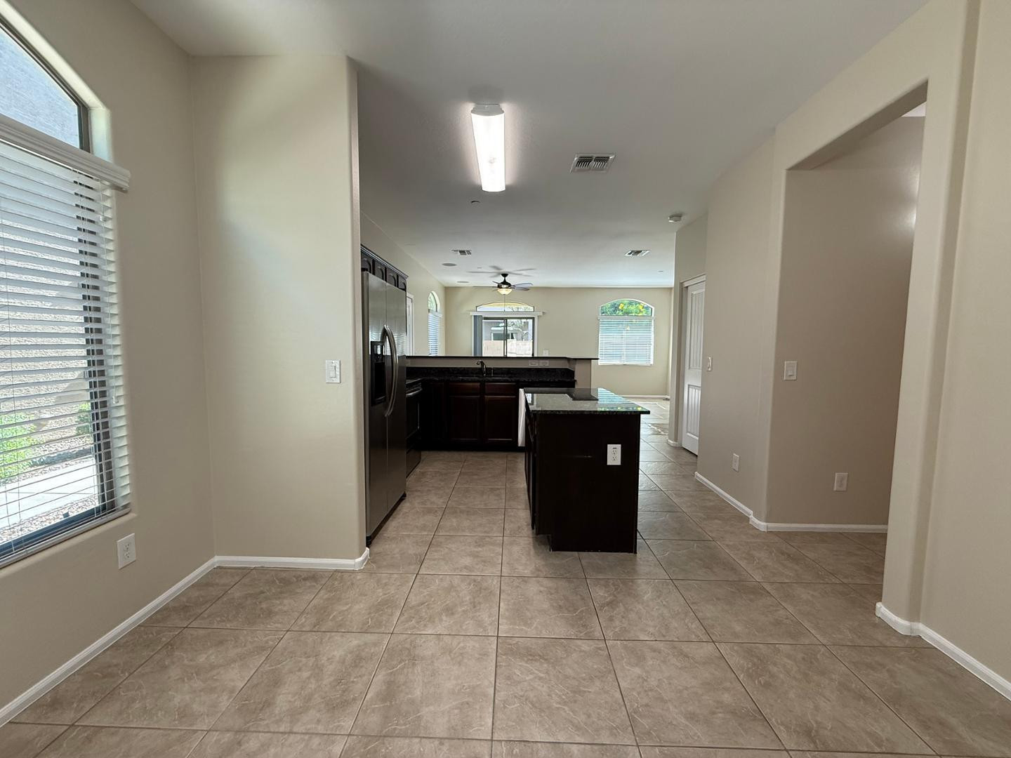 2725 East Mine Creek Road, Unit 1151 Phoenix, AZ 85024 - Photo 7 of 31 a view of kitchen with stainless steel appliances granite countertop cabinets and window