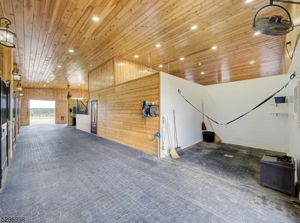a view of a living room and wooden floor