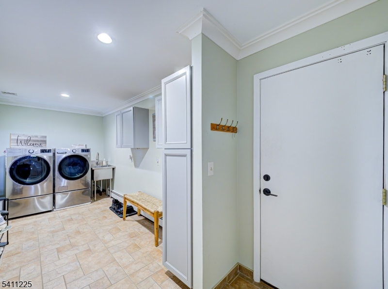 33 Kappus Road Milford, NJ 08848 - Photo 28 of 50 a view of a storage & utility room with two washing machine