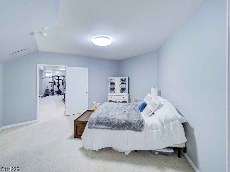 33 Kappus Road Milford, NJ 08848 - Photo 47 of 50 a bedroom with a bed and wall painting