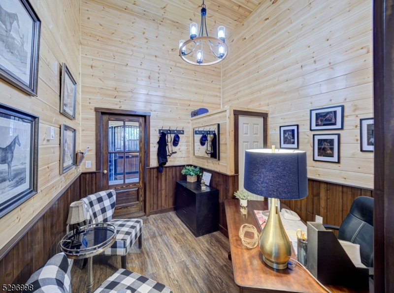 33 Kappus Road Milford, NJ 08848 - Photo 10 of 50 a living room with furniture a dining table and paintings on the wall