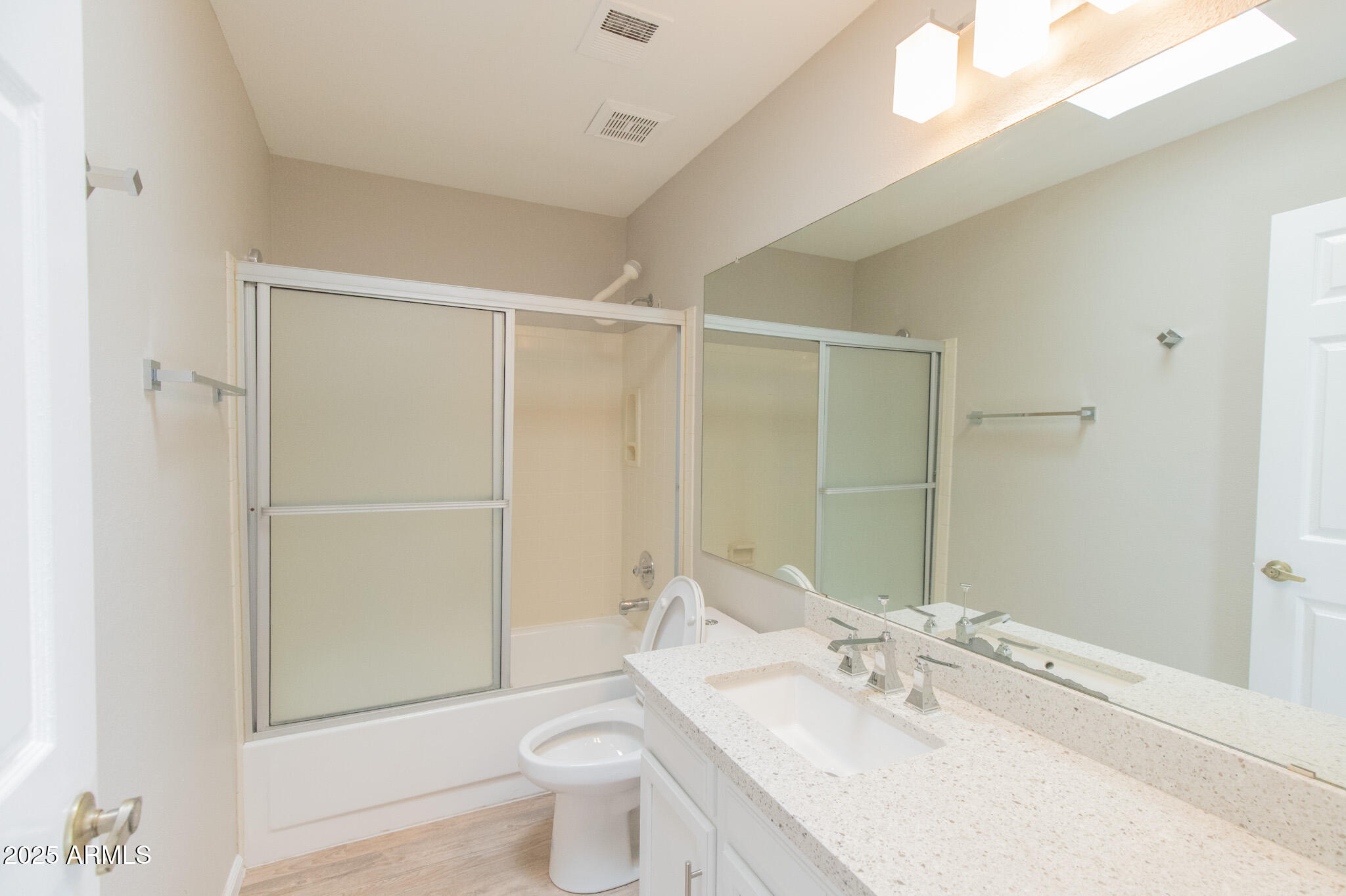 2034 South Paseo Loma Mesa, AZ 85202 - Photo 10 of 27 a bathroom with a granite countertop sink toilet and shower