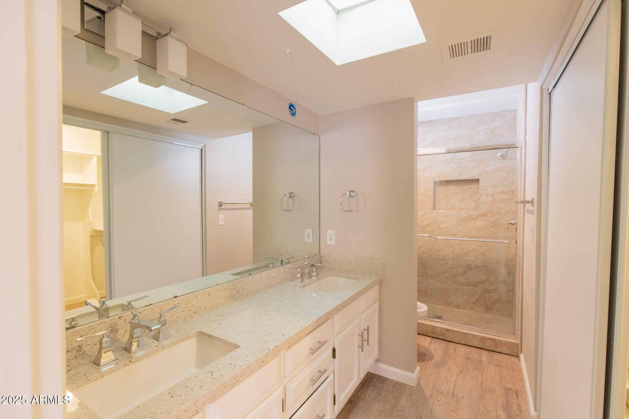 2034 South Paseo Loma Mesa, AZ 85202 - Photo 20 of 27 a bathroom with a granite countertop sink a mirror and a