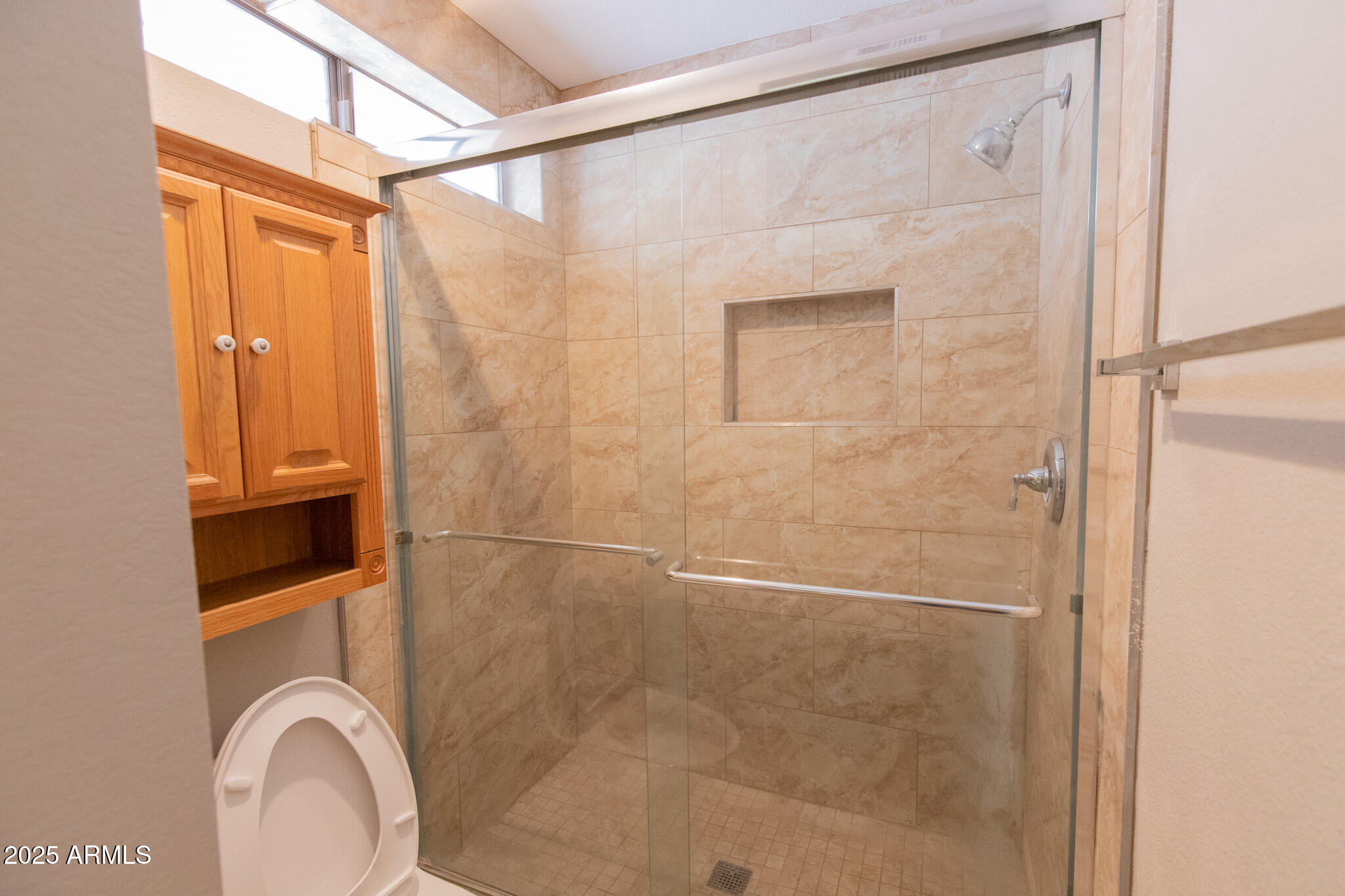 2034 South Paseo Loma Mesa, AZ 85202 - Photo 21 of 27 a bathroom with a sink a mirror and a shower