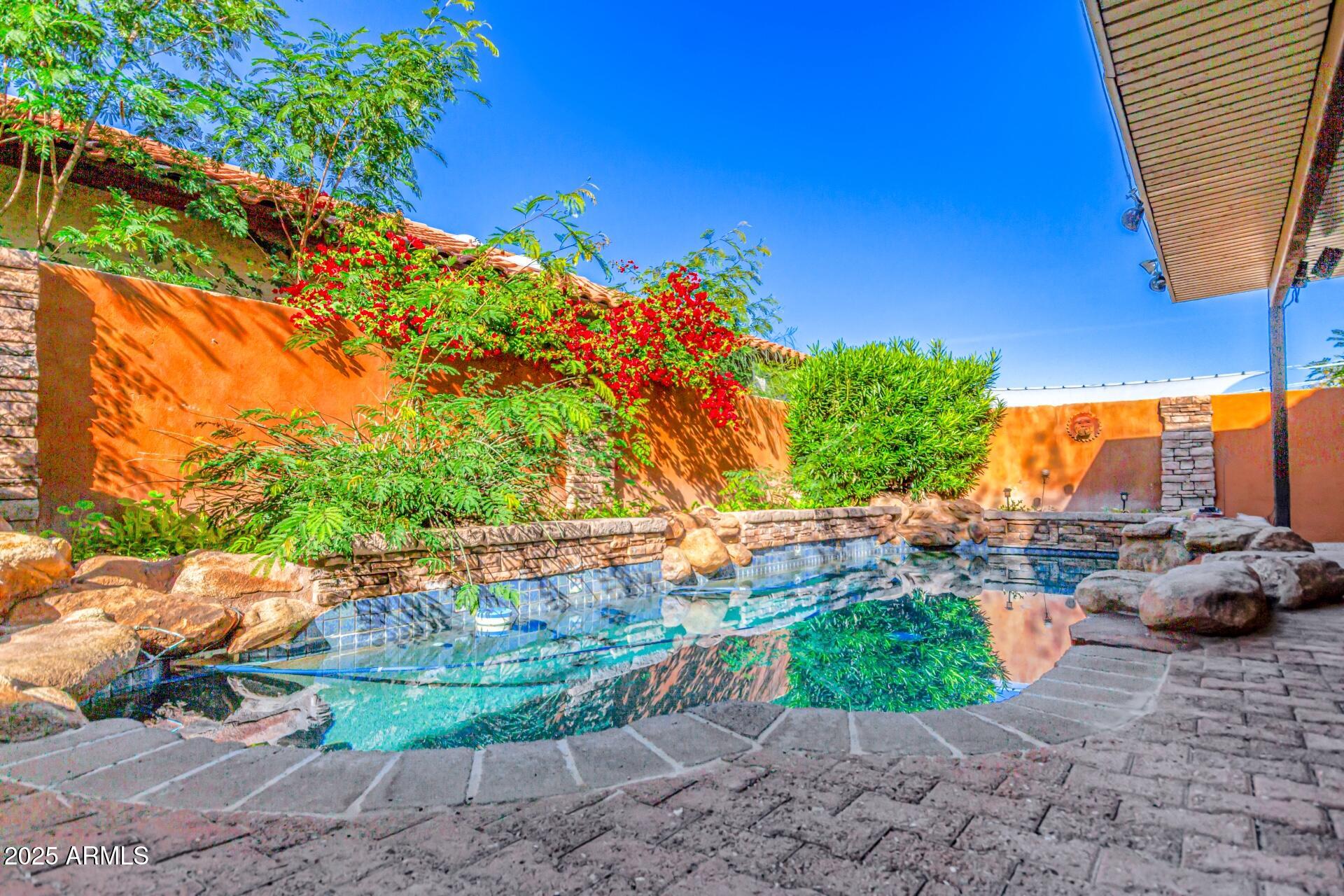 2034 South Paseo Loma Mesa, AZ 85202 - Photo 26 of 27 a garden view with a seating space