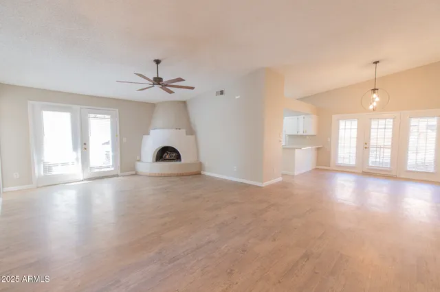 a kitchen with stainless steel appliances a refrigerator and a sink