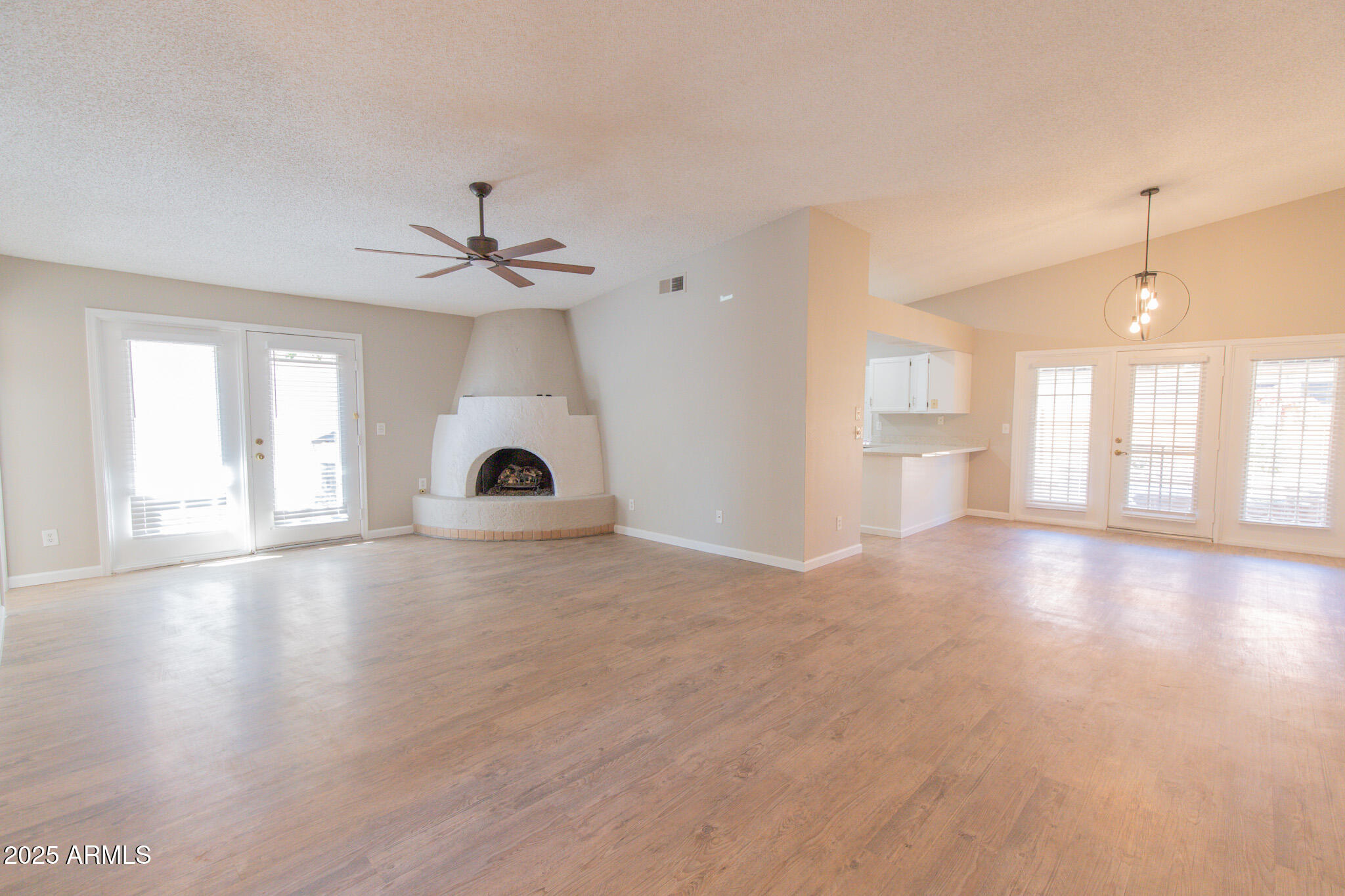 2034 South Paseo Loma Mesa, AZ 85202 - Photo 2 of 27 a view of a room with window and hardwood floor