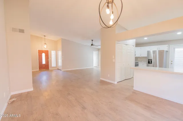 a view of a big room with carpet