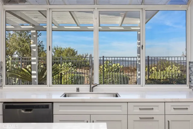 a view of a window and a sink
