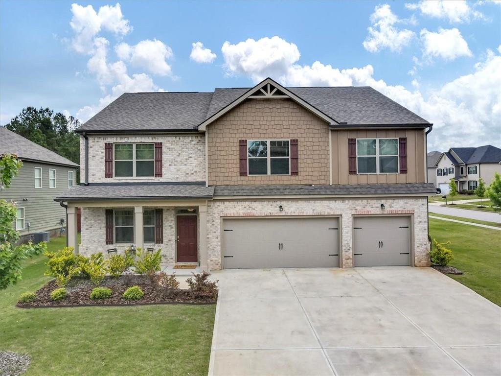 a house view with a garden space