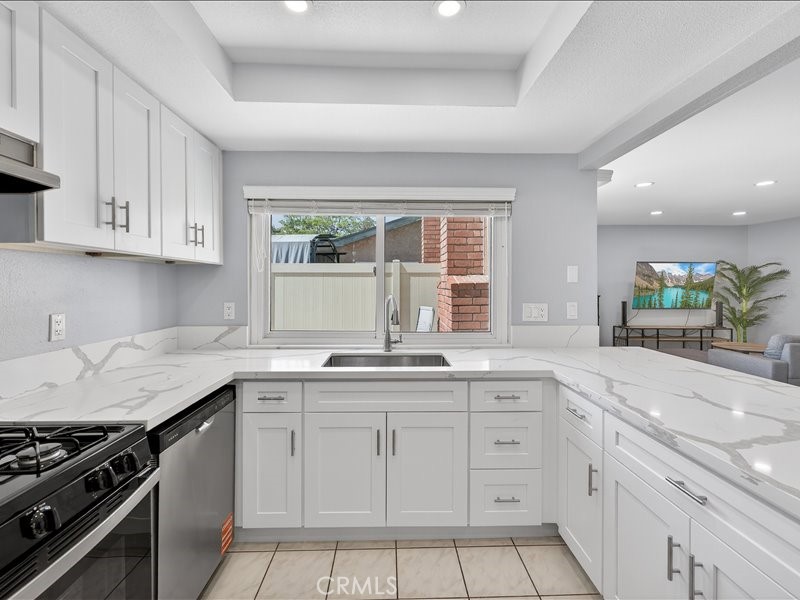 Brand-new kitchen featuring modern cabinetry, sleek finishes, and stainless-steel appliances