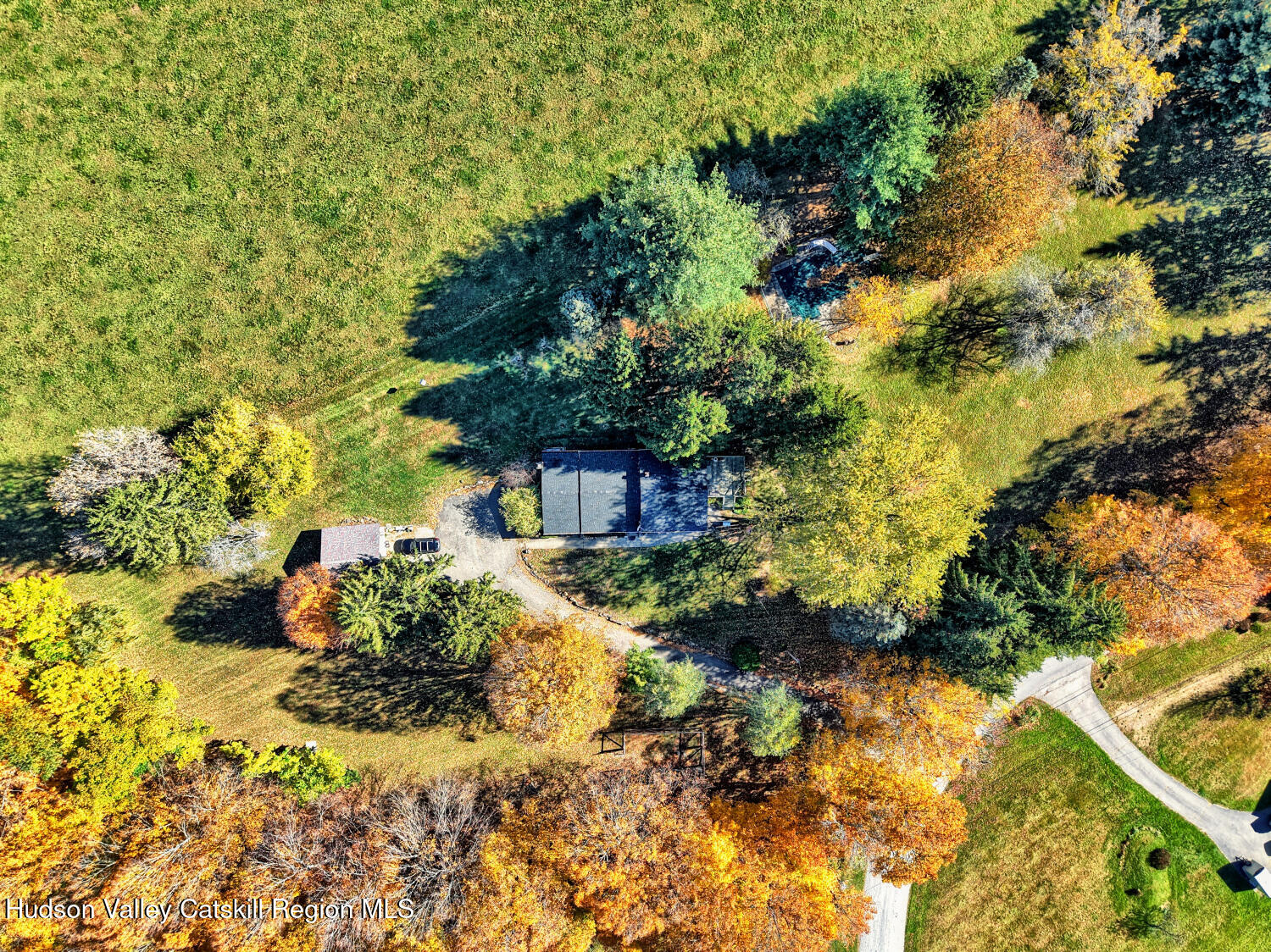 31 Yellow City Road Amenia, NY 12501 - Photo 12 of 80 a backyard of a house with a yard and outdoor seating