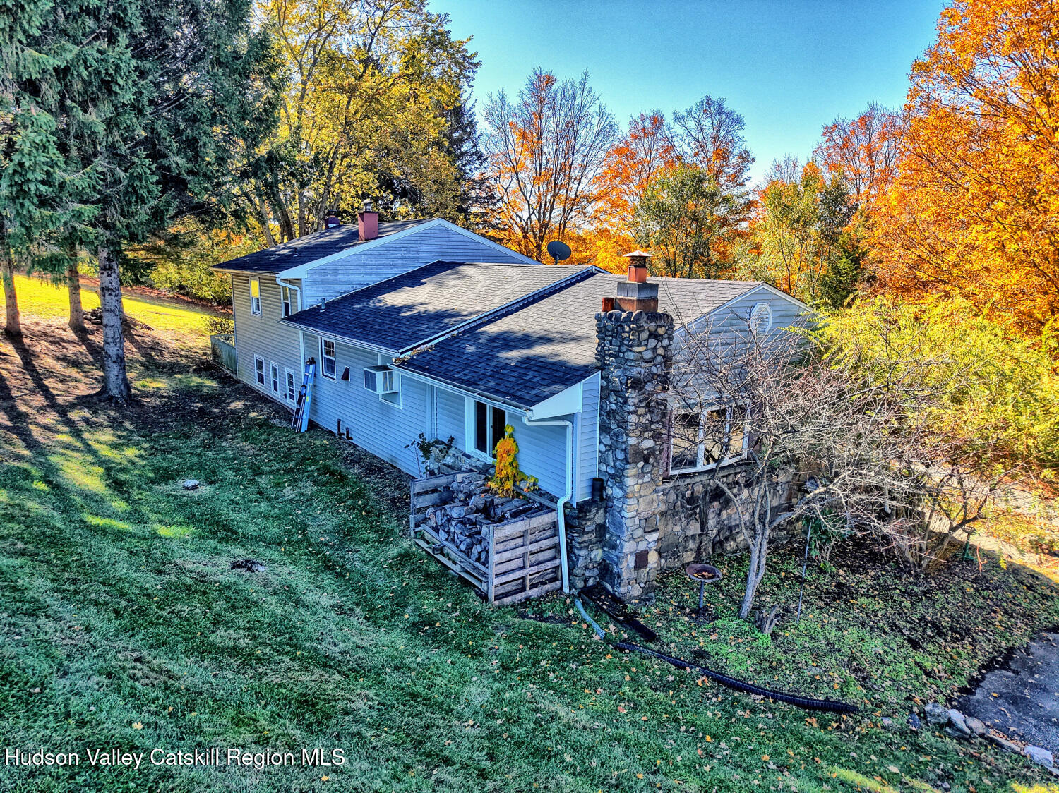 31 Yellow City Road Amenia, NY 12501 - Photo 13 of 80 a view of a house with a yard and hanging chair