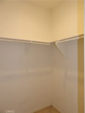 a bathroom with a shower and a toilet