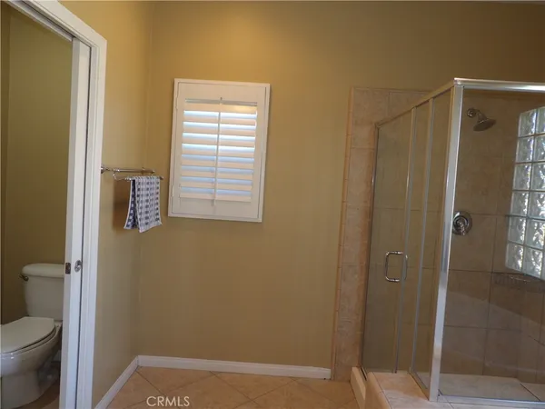 a bathroom with a tub and a shower