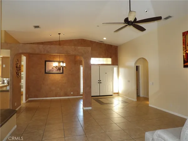 a view of a livingroom with a staircase