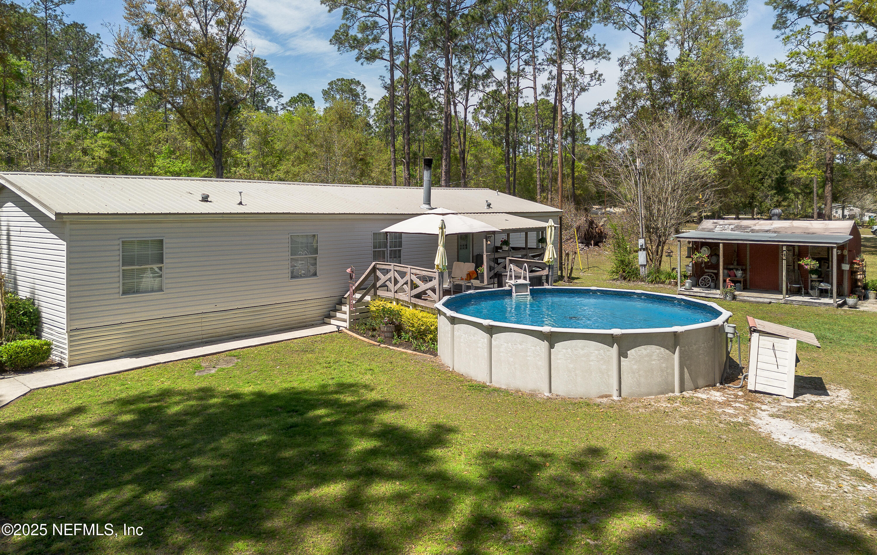 1357 Starling Road Middleburg, FL 32068 - Photo 37 of 46 Backyard Pool