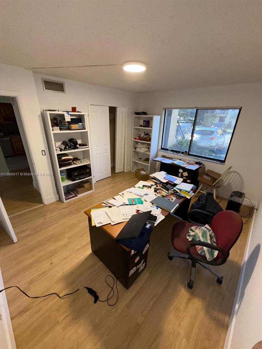 440 Lakeview Drive, Unit 102 Weston, FL 33326 - Photo 14 of 19 a room with furniture pool table and window