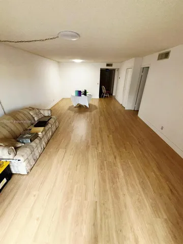 a bedroom with bed and window