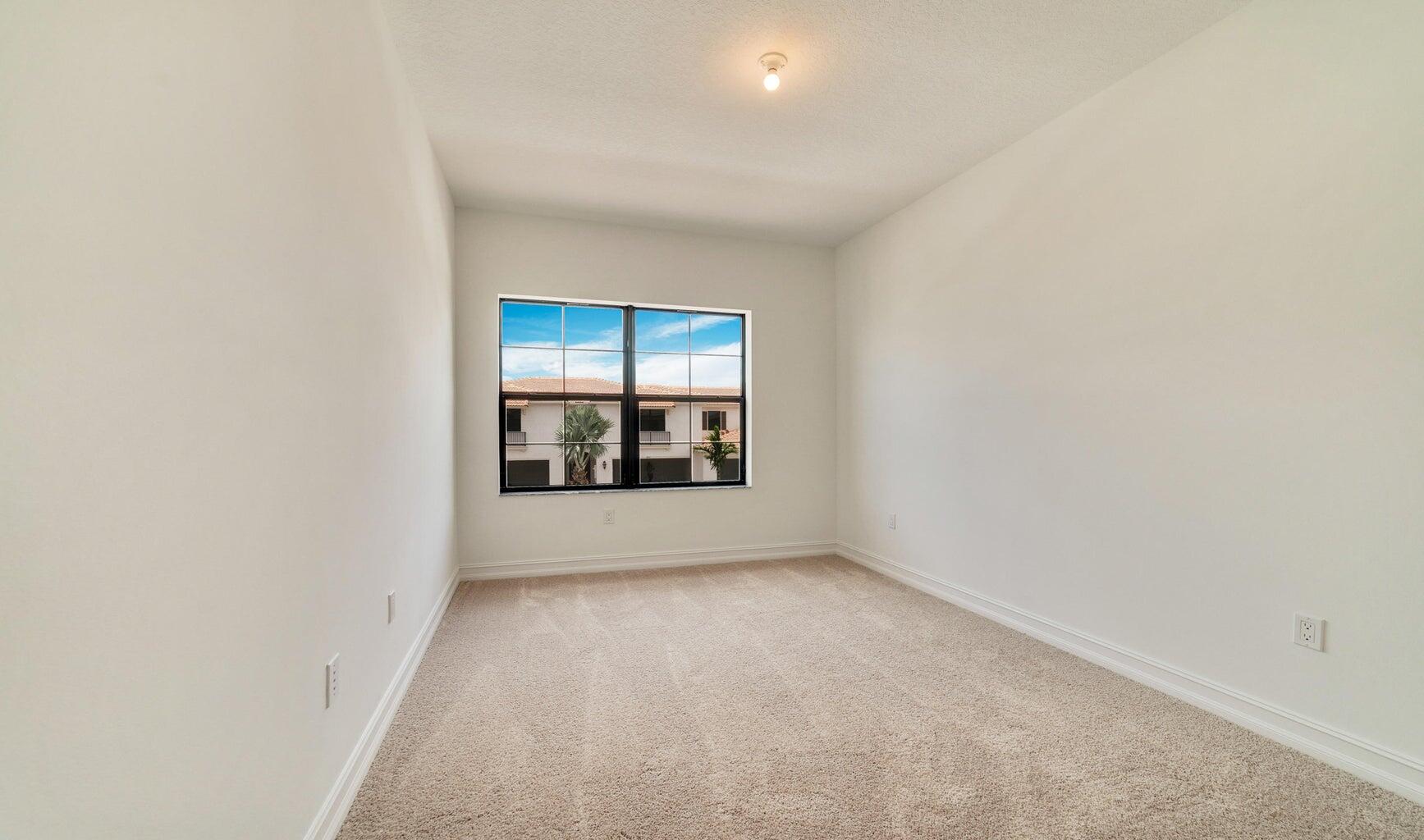 9952 Brickhill Drive Boca Raton, FL 33428 - Photo 11 of 24 an empty room with window