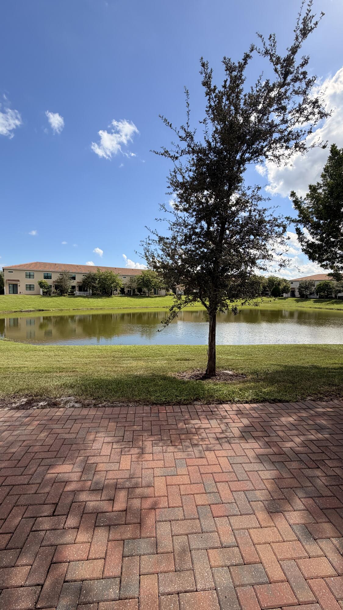 9952 Brickhill Drive Boca Raton, FL 33428 - Photo 4 of 24 a view of a lake with a big yard
