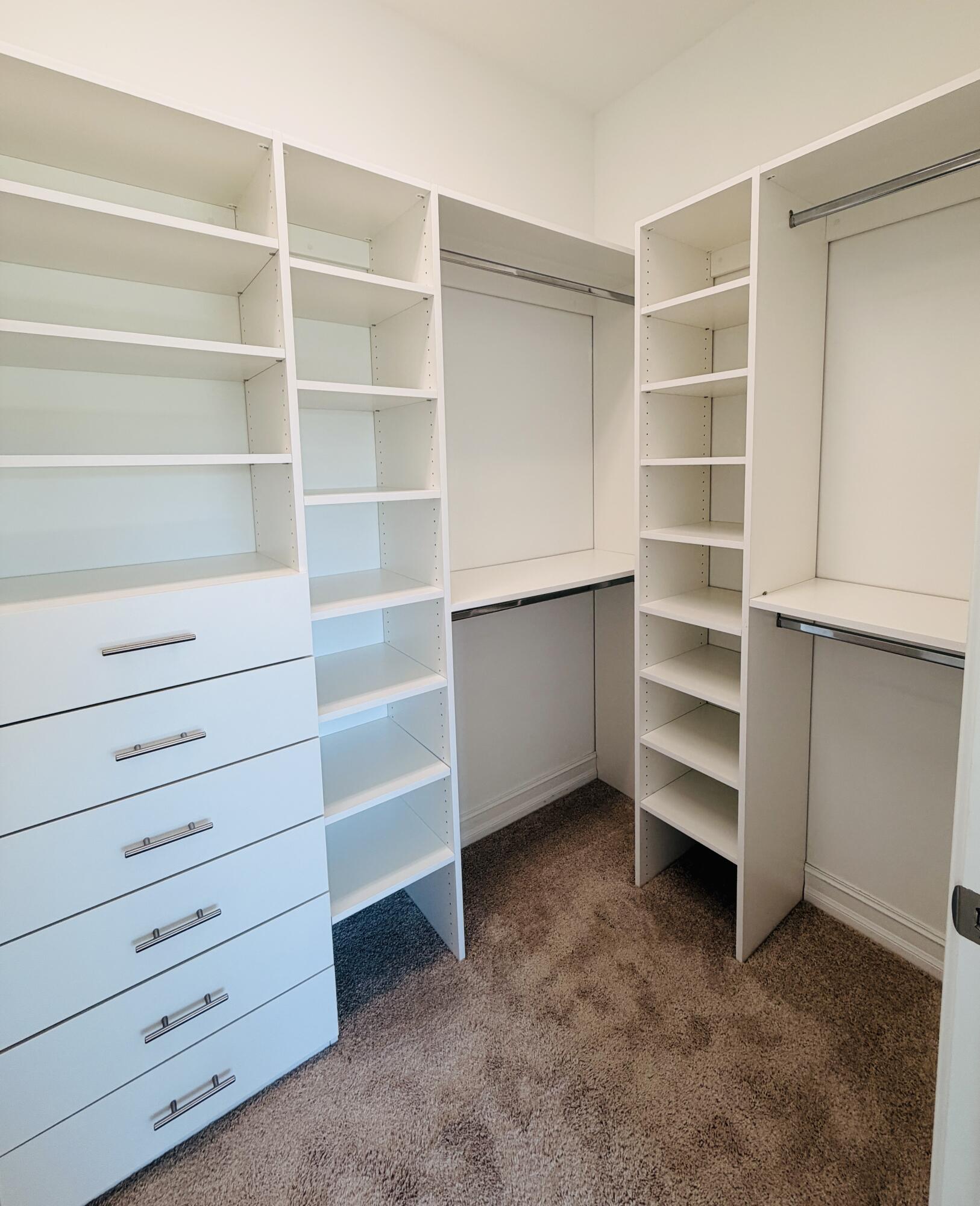 9952 Brickhill Drive Boca Raton, FL 33428 - Photo 8 of 24 a view of an empty walk in closet