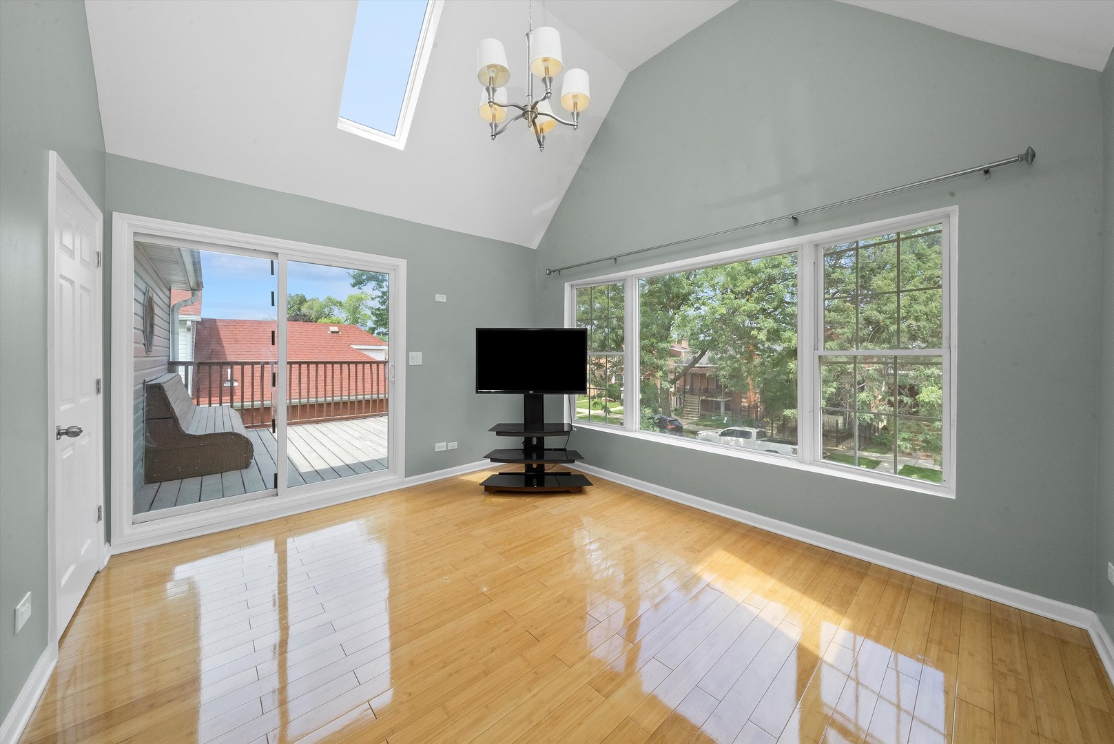 3343 West 59th Place, Unit 2 Chicago, IL 60629 - Photo 3 of 10 a view of a livingroom with workspace and a window